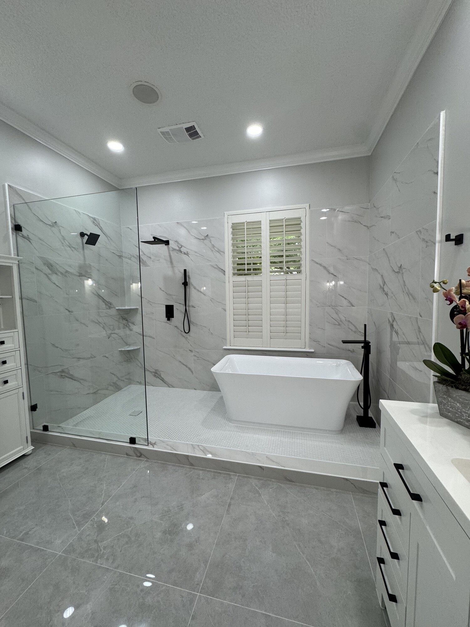 Marble Master Bath with Freestanding Tub